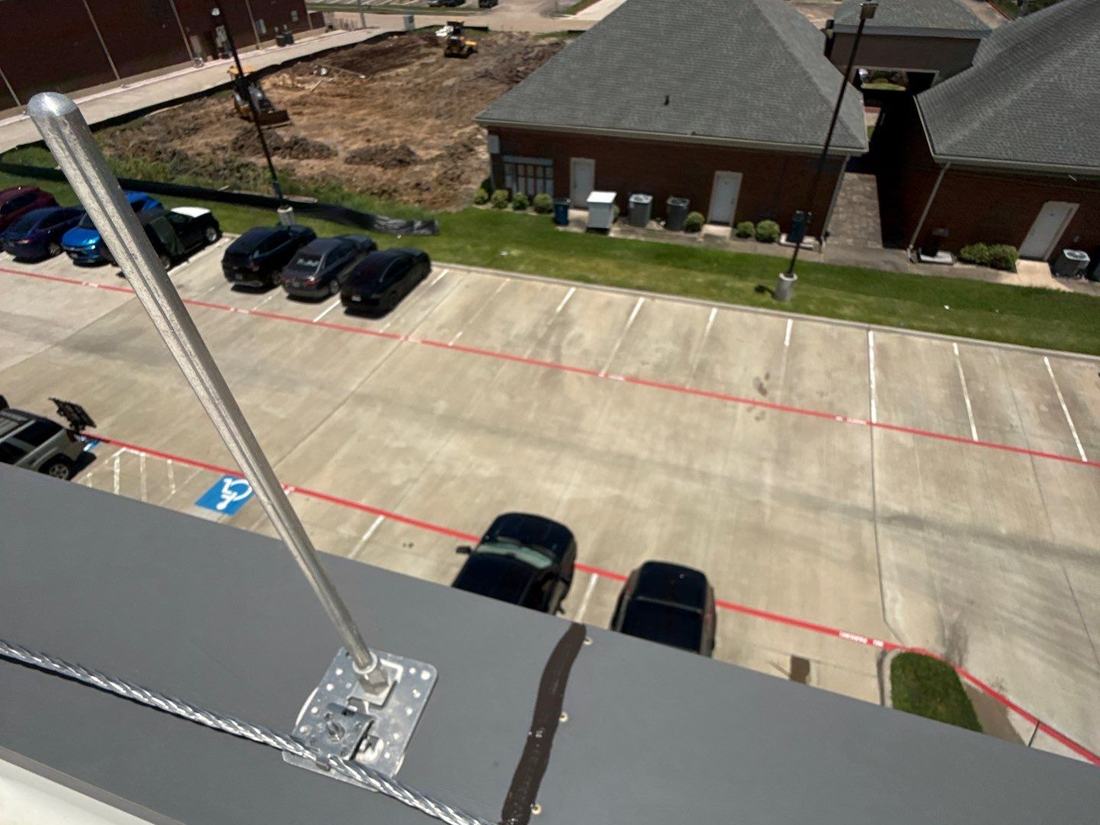 Standing-seam metal roof installed by Houston Roofing in the Clear Lake area