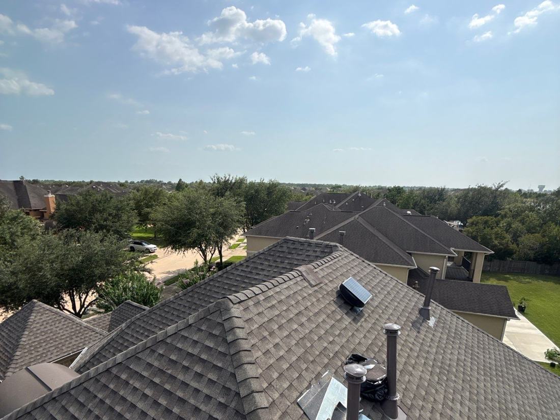 On the roof during a shingle replacement project in Sugar Land