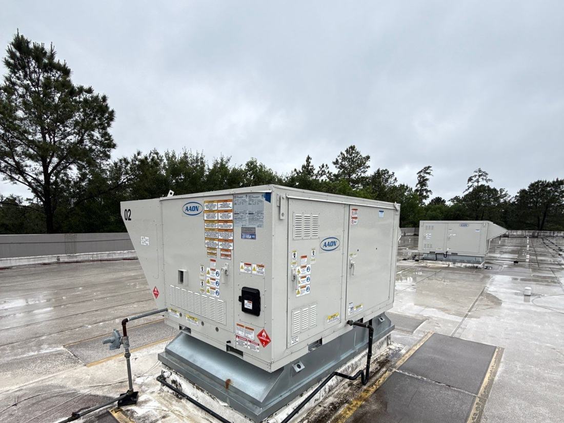 Commercial flat roof service visit in The Woodlands